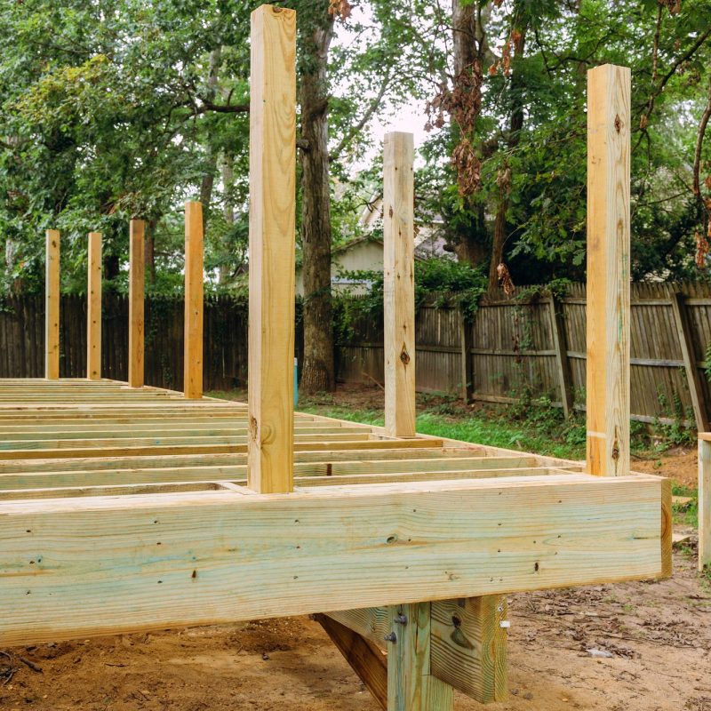 Installing wood floor for patio deck with new wooden decking fragment planks